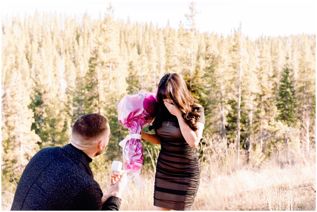 Proposal during family session in Vail